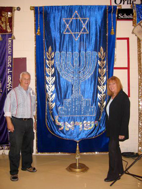 Standing with the banner of Israel